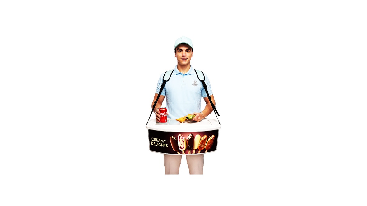Ergonomic vending belly tray for flexible direct sales of canned and bottled beverages directly to customers at events.